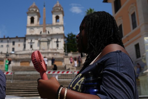 A woman visits the historical Spanish steps in Rome, Tuesday, June 23, 2026. (AP Photo/Alessandra Tarantino)