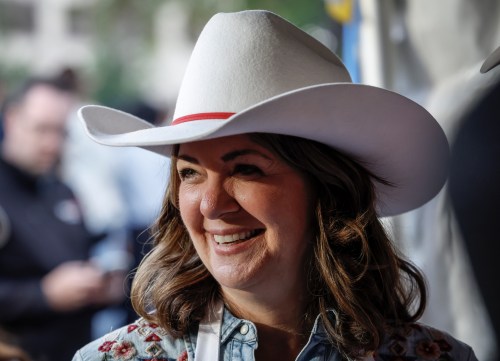 Alberta Premier Danielle Smith wears a cowboy hat at the annual Stampede breakfast in Calgary on Monday, July 7, 2025. THE CANADIAN PRESS/Jeff McIntosh