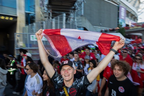 Soccer fans leave BC Place as Canadian fans celebrate a win over Qatar during the FIFA World Cup in Vancouver, on Thursday, June 18, 2026. THE CANADIAN PRESS/Chad Hipolito