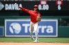 Washington Nationals shortstop CJ Abrams throws to first base to put out Seattle Mariners' Luke Raley during the sixth inning of a baseball game, Sunday, June 14, 2026, in Washington. (AP Photo/Nick Wass)