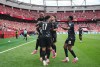 Canada players celebrate Jonathan David's goal against Qatar during the first half of a World Cup Group B soccer match, in Vancouver, on Thursday, June 18, 2026. THE CANADIAN PRESS/Darryl Dyck