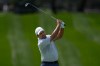 FILE - Francesco Molinari of Italy plays his second shot on the first hole during the third round of the Dubai Desert Classic in United Arab Emirates, Saturday, Jan. 24, 2026. (AP Photo/Altaf Qadri, file)