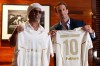 Brazilian football legend Ronaldinho, left, holds up jerseys along with Ignazio Cipriani, president of Ravenna FC, at a media event celebrating Ronaldinho's recent signing with the Italian soccer club, at Cipriani Downtown Miami restaurant, Tuesday, June 23, 2026, in Miami. (AP Photo/Rebecca Blackwell)