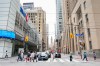 A general view of pedestrians crossing Bay St. in the financial district in Toronto, Friday, Sept. 8, 2023. THE CANADIAN PRESS/Andrew Lahodynskyj