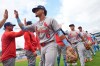 St. Louis Cardinals' Masyn Winn (0) celebrates with teammates afte a baseball game against the Kansas City Royals, Sunday, June 21, 2026, in Kansas City, Mo. (AP Photo/Charlie Riedel)