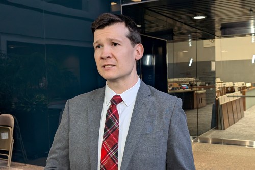Calgary Mayor Jeromy Farkas speaks outside of city council chambers, in Calgary, Tuesday, Feb. 3, 2026. THE CANADIAN PRESS/Dayne Patterson