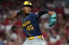 Milwaukee Brewers' Abner Uribe delivers during the eighth inning of a baseball game against the Cincinnati Reds, Tuesday, June 23, 2026, in Cincinnati. (AP Photo/Kareem Elgazzar)