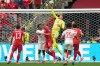 Switzerland goalkeeper Gregor Kobel (1) jumps to make a save during the World Cup Group B soccer match between Switzerland and Canada in Vancouver, British Columbia, Wednesday, June 24, 2026. (AP Photo/Abbie Parr)