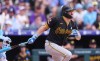 Pittsburgh Pirates' Spencer Horwitz watches his single off Colorado Rockies starting pitcher Michael Lorenzen in the third inning of a baseball game Sunday, June 21, 2026, in Denver. (AP Photo/David Zalubowski)