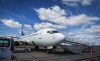A WestJet plane on the tarmac at Yellowknife Airport on Tuesday, July 22, 2025. THE CANADIAN PRESS/Jeff McIntosh