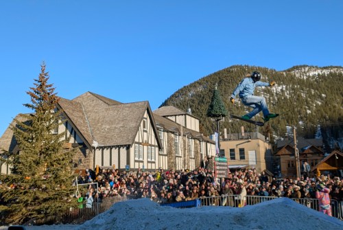 A Skijor skier is airborne as the packed crowd cheers at the SnowDays Skijoring event in Banff, Alta., Saturday, Jan. 17, 2026. THE CANADIAN PRESS/Dayne Patterson