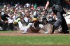 Athletics' Lawrence Butler, center, slides home safe in front of San Francisco Giants catcher Eric Haase (18) on a single hit by Jeff McNeil during the eighth inning of a baseball game in San Francisco, Thursday, June 25, 2026. (AP Photo/Jed Jacobsohn)