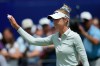 Nelly Korda reacts after finishing the first round of the Women's PGA Championship golf tournament, Thursday, June 25, 2026, in Chaska, Minn. (AP Photo/Matt York)