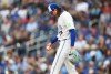 Blue Jays pitcher Kevin Gausman reacts after giving up a solo home run to Texas Rangers designated hitter Joc Pederson during a Major League Baseball game in Toronto on June 25, 2026. THE CANADIAN PRESS/Nathan Denette