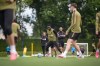Canada's Alphonso Davies, centre, participates in a FIFA World Cup soccer training session, in Vancouver, on Thursday, June 25, 2026. THE CANADIAN PRESS/Darryl Dyck