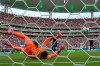 Uruguay goalkeeper Fernando Muslera (23) is beaten by a shot from Spain's Alex Baena (15) for the opining goal during the World Cup Group H soccer match between Uruguay and Spain in Zapopan, near Guadalajara, Mexico, Friday, June 26, 2026. (AP Photo/Natacha Pisarenko )