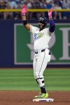 Tampa Bay Rays' Yandy Díaz celebrates his double during the sixth inning of a baseball game against the Arizona Diamondbacks, Friday, June 26, 2026, in St. Petersburg, Fla. (AP Photo/Jason Behnken)