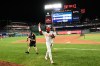 Philadelphia Phillies' Derek Hill gestures to the crowd after a baseball game against the Washington Nationals, Wednesday, June 24, 2026, in Washington. (AP Photo/Nick Wass)