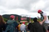 A fan cheers after a goal scored by England at a watch party at Grouse Mountain in Canada's British Columbia, for the FIFA World Cup Group L soccer match between England and Panama, Saturday, June 27, 2026. (AP Photo/Abbie Parr)