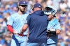 Toronto Blue Jays manager John Schneider pulls Dylan Cease (84) from the game during fifth inning American League MLB baseball action against the Texas Rangers, in Toronto, Saturday, June 27, 2026. THE CANADIAN PRESS/Nathan Denette