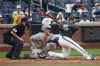 New York Mets' Juan Soto hits a triple during the seventh inning of a baseball game against the Philadelphia Phillies, Saturday, June 27, 2026, in New York. (AP Photo/Heather Khalifa)