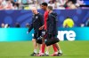 England's Jarell Quansah, center, leaves the pitch with medical staff after an injury during the World Cup Group L soccer match against Panama in East Rutherford, N.J., near New York, Saturday, June 27, 2026. (AP Photo/Frank Franklin II)