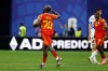 Congo's Yoane Wissa (20) celebrates their first goal on a penalty kick during the World Cup Group K soccer match between DR Congo and Uzbekistan in Atlanta, Saturday, June 27, 2026. (AP Photo/Erik S. Lesser)