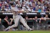 Colorado Rockies' Hunter Goodman hits a three-run home run against the Minnesota Twins in the seventh inning of a baseball game Saturday, June 27, 2026, in Minneapolis. (AP Photo/Bruce Kluckhohn)