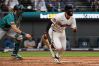 Cleveland Guardians' Cooper Ingle watches his first Major League hit, an RBI single off Seattle Mariners starting pitcher Logan Gilbert as Cal Raleigh moves into position during the third inning of a baseball game, Saturday, June 27, 2026, in Cleveland. (AP Photo/Phil Long)