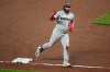 Washington Nationals' Luis Garcia Jr. celebrates as he rounds the bases after hitting a solo home run during the fifth inning of a baseball game against the Baltimore Orioles, Saturday, June 27, 2026, in Baltimore. (AP Photo/Nick Wass)