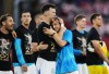 Croatia's Luka Modric (right) celebrates with Ivan Perisic after defeating Panama as teammates wear shirts honouring his 200th appearance for Croatia following a World Cup Group L soccer match, in Toronto, on Tuesday, June 23, 2026. THE CANADIAN PRESS/Nathan Denette
