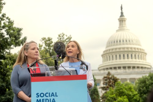 Kristin Bride, right, mother of 16-year-old Carson Bride, who died by suicide after being cyber-bullied on an anonymous app on Snapchat, is joined by Amy Neville, left, mother of 14-year-old Alexander Neville, who died from fentanyl poisoning after being deceived by a drug dealer operating on Snapchat, during a Social Media Victims Remembrance Day memorial on Capitol Hill, Tuesday, June 23, 2026, in Washington. (AP Photo/Rod Lamkey, Jr.)