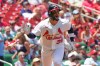 St. Louis Cardinals' Bryan Torres watches his two-run home run during the second inning of a baseball game against the Miami Marlins Sunday, June 28, 2026, in St. Louis. (AP Photo/Jeff Roberson)