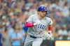Chicago Cubs designated hitter Seiya Suzuki runs to first base on a two-RBI single during the 10th inning of a baseball game against the Milwaukee Brewers, Sunday, June 28, 2026, in Milwaukee. (AP Photo/Kayla Wolf)