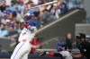 Toronto Blue Jays' Vladimir Guerrero Jr. (27) loses his grip on the bat as Texas Rangers catcher Kyle Higashioka (11) looks on during first inning MLB baseball action in Toronto, on Thursday, June 25, 2026. THE CANADIAN PRESS/Nathan Denette