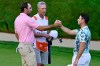 Scottie Scheffler, left, shakes hands with Viktor Hovland, right, of Norway, after finishing tied in the final round of the Travelers Championship golf tournament at TPC River Highlands, Sunday, June 28, 2026, in Cromwell, Conn. (AP Photo/Jessica Hill)