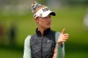 Nelly Korda talks to her caddie on the first hole during the final round of the Women's PGA Championship golf tournament at Hazeltine National Golf Club, Sunday, June 28, 2026, in Chaska, Minn. (AP Photo/Matt York)