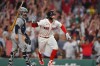 Boston Red Sox's Jarren Duran, right, celebrates in front of New York Yankees catcher Austin Wells, left, after hitting a walk-off one-run single in the tenth inning of a baseball game, Sunday, June 28, 2026, in Boston. (AP Photo/Steven Senne)