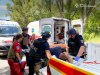 In this photo provided by the Ukrainian Emergency Services on Monday, June 29, 2026, a rescue worker with paramedics move an injured man into an ambulance after a Russian drone strike on passengers minivan in Dnipropetrovsk region, Ukraine. (Ukrainian Emergency Service via AP)
