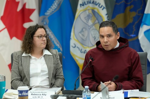 Minister of Crown-Indigenous Relations Rebecca Alty looks on as Inuit Tapiriit Kanatami President Natan Obed delivers opening remarks at the meeting of the Inuit-Crown Partnership Committee in Ottawa, Monday, Nov. 24, 2025. THE CANADIAN PRESS/Adrian Wyld