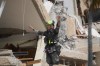 A rescuer from a U.S. search-and-rescue team evaluates access to an earthquake-damaged building in Catia La Mar, Venezuela, Sunday, June 28, 2026. (AP Photo/Fernando Vergara)