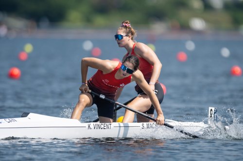 Katie Vincent, left, and teammate Sloan MacKenzie, of Canada, react at the finish line following the C2 women’s 500m during the ICF Canoe Sprint and Paracanoe World Championships in Dartmouth, N.S. on Saturday, Aug. 6, 2022. THE CANADIAN PRESS/Darren Calabrese