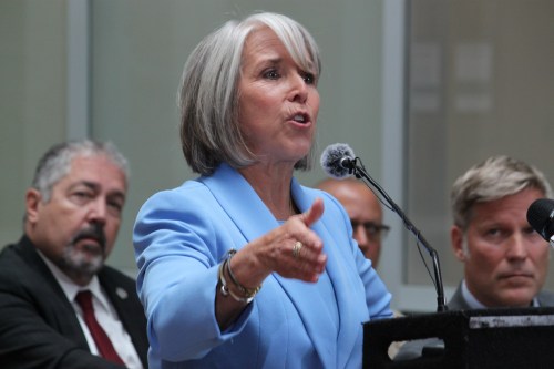 New Mexico Gov. Michelle Lujan Grisham speaks about holding federal authorities accountable for policies that allowed fentanyl pills to reach the streets, during a news conference in Albuquerque, on Monday, June 29, 2026. (AP Photo/Susan Montoya Bryan)