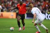 Belgium's Romelu Lukaku (9) drives towards New Zealand's Francis de Vries (3) during the World Cup Group G soccer match between New Zealand and Belgium in Vancouver, British Columbia, Friday, June 26, 2026. (AP Photo/Kaleb Tatum)