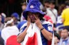 A Japan supporter reacts after the World Cup round of 32 soccer match between Brazil and Japan in Houston, Monday, June 29, 2026. (AP Photo/David J. Phillip)