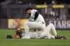 New York Yankees' Jasson Domínguez, top, checks on teammate Jazz Chisholm Jr., bottom, after they collided while pursuing a ball hit by Detroit Tigers' Hao-Yu Lee during the fourth inning of a baseball game Monday, June 29, 2026, in New York. (AP Photo/Pamela Smith)