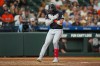 Minnesota Twins' Royce Lewis celebrates as he tags home after hitiing a solo home run during the fourth inning of a baseball game against the Houston Astros in Houston, Monday, June 29, 2026. (AP Photo/Jon Shapley)