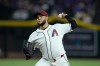 Arizona Diamondbacks starting pitcher Eduardo Rodriguez throws against the San Francisco Giants during the first inning of a baseball game, Monday, June 29, 2026, in Phoenix. (AP Photo/Ross D. Franklin)