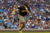 San Diego Padres' Jake Cronenworth runs after hitting a sacrifice bunt during the third inning of a baseball game against the Chicago Cubs in Chicago, Monday, June 29, 2026. (AP Photo/Nam Y. Huh)