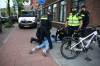 Police arrest a Moroccan fan after a World Cup soccer match between the Netherlands and Morocco in The Hague, Netherlands, Tuesday, June30, 2026. (AP Photo/Mouneb Taim)